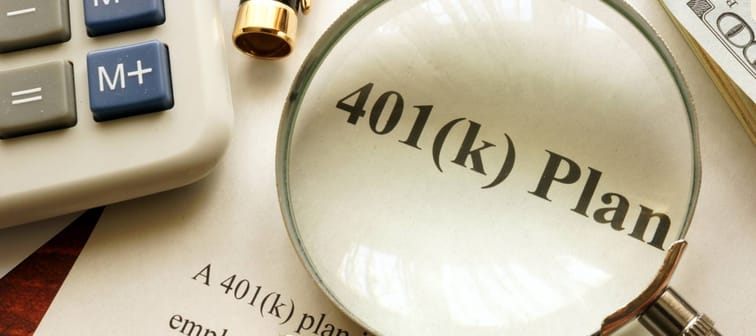 Document with title 401k plan on a table.