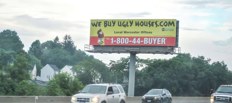 We Buy Ugly Houses billboard sign