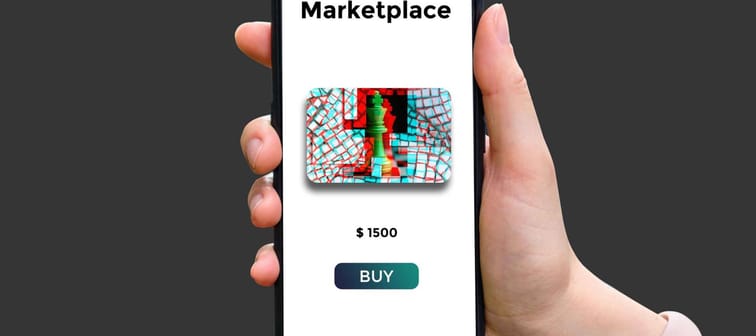 Hand holds smartphone with type of cryptographic NFT marketplace with art sale