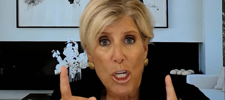 Suze Orman speaks and gestures during video interview with Moneywise