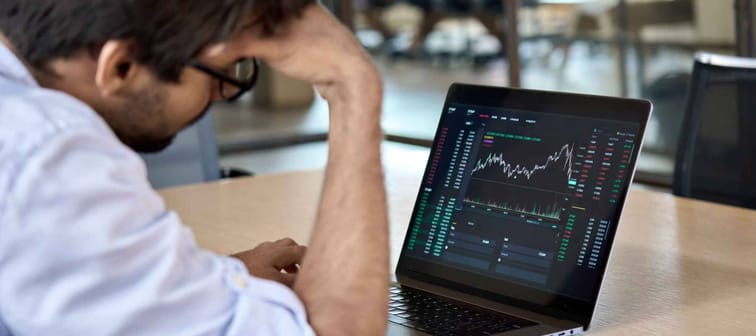 Stressed business man crypto trader broker investor analyzing stock exchange market crypto trading decreasing