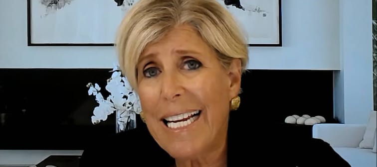 Suze Orman speaking during a video interview.
