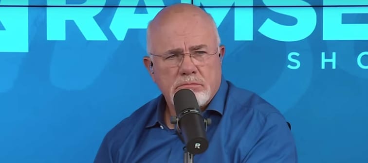 Dave Ramsey makes an incredulous face while talking on the set of his radio show.
