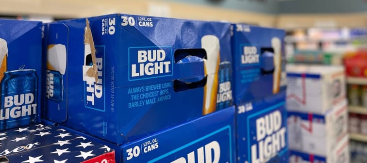 Display of Bud Light cases in a store.