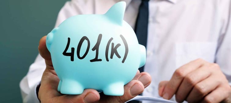 Man proposes piggy bank with sign 401k. Retirement pension plan.