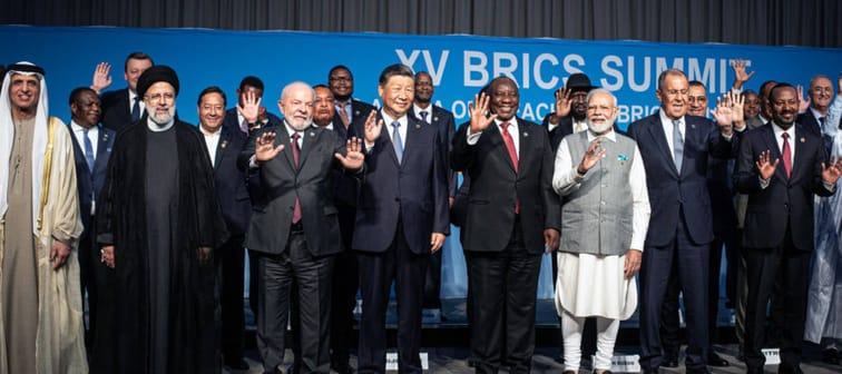 Current BRICS leaders and delegates from the 6 new member countries pose on stage the BRICS summit  on August 24, 2023 in Johannesburg, South Africa.