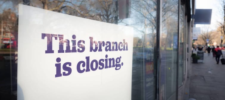 Branch closing sign in window