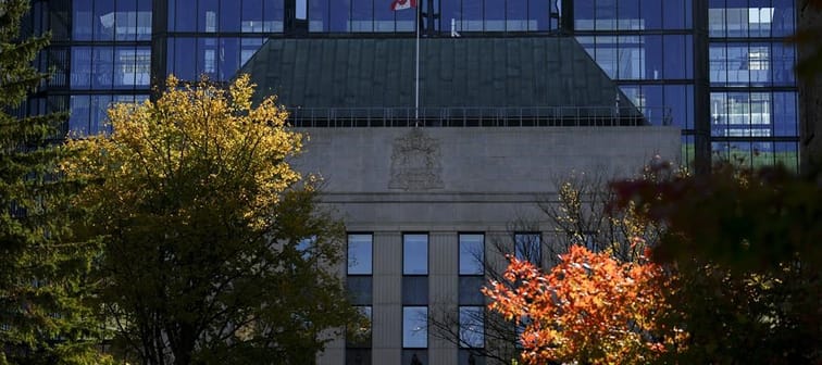 The Bank of Canada is framed by fall-coloured leaves in Ottawa on Monday, Oct. 23, 2023. The Bank of Canada&rsquo;s public consultations on the creation of a digital Canadian dollar reveal mo