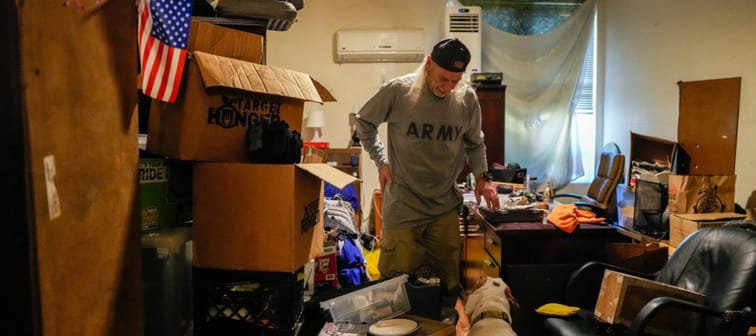 Army Veteran Ronald Payne packs his belongings in preparation for an eviction due to paperwork issues on Friday, Nov. 17, 2023, in Houston.