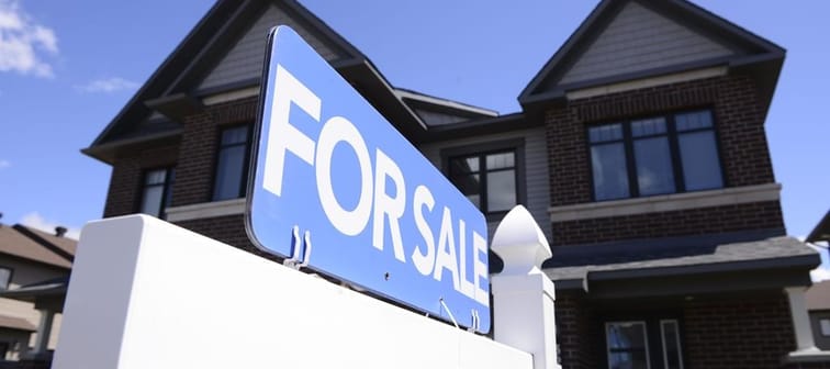 A majority of Canadians aspiring to buy a home say they will push their plans to next year or later and wait for interest rates to drop, a survey shows. A new home is shown for sale in a hous