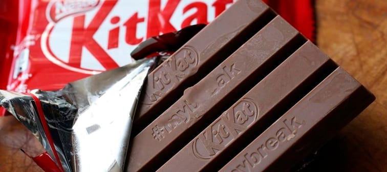 A Kit Kat chocolate bar is photographed Wednesday July 25, 2018, in Rugby, England. Hundreds of Nestle workers walked off the job in Toronto on Sunday after their union said the company would