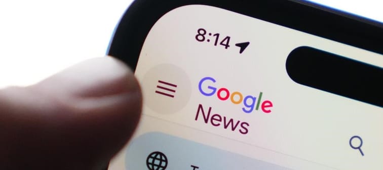 The Google News homepage is displayed on an iPhone in Ottawa on Tuesday, Feb. 28, 2023. Google is taking Canada's broadcasting regulator to court, arguing "significant" revenues it earns from