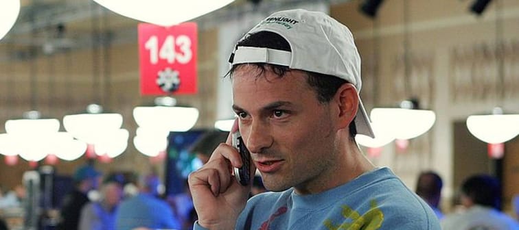 David Einhorn, hedge fund manager, seen talking into a cellphone while at a poker game.