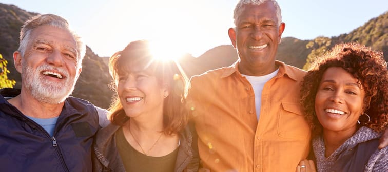 A group of retiree friends walking outdoors.