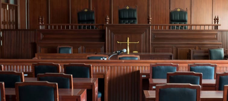 Table and chair in the courtroom of the judiciary.