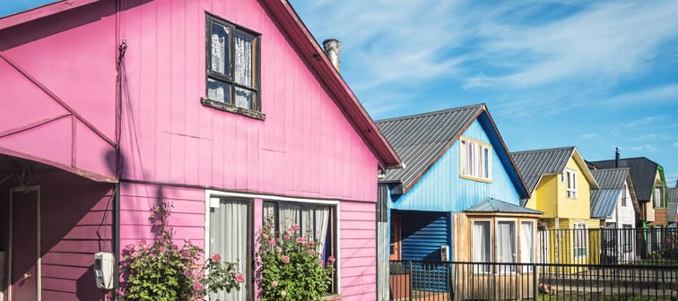 A row of brightly colored houses.