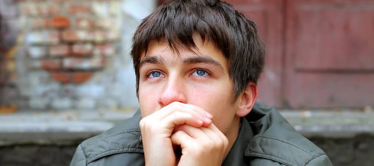 Sad man sitting