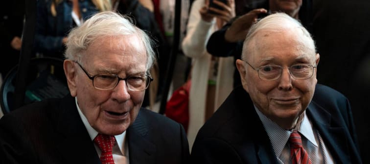 Warren Buffett (L), CEO of Berkshire Hathaway, and vice chairman Charlie Munger attend the 2019 annual shareholders meeting