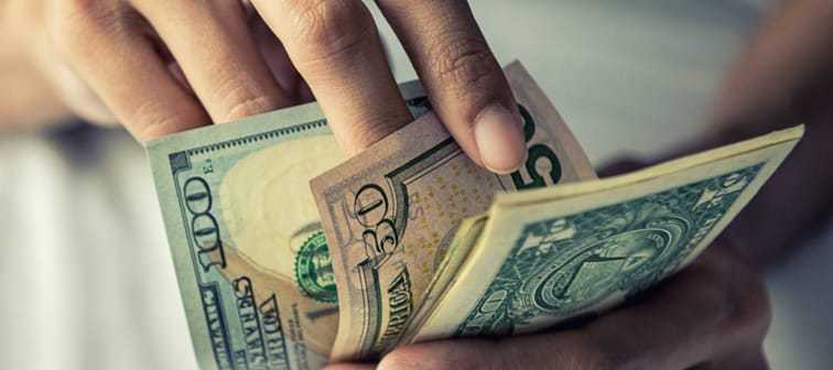 Hands holding money