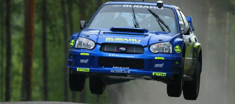 Tommi Makinen drives his Subaru Impreza during the first leg of the WRC Rally of Finland, Aug. 8, 2003.