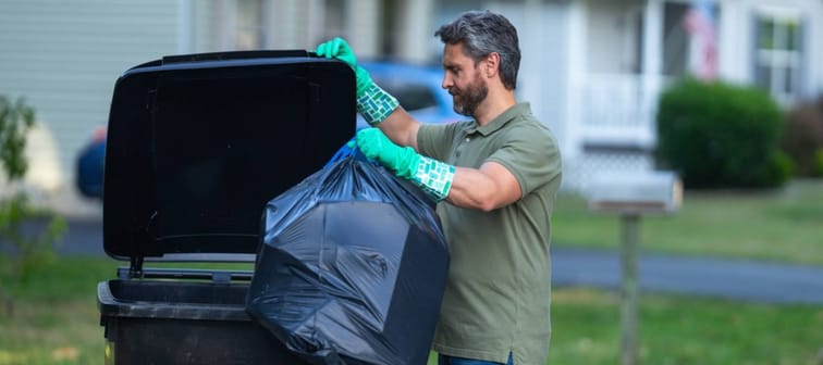 Taking out trash.