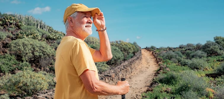 Older gentleman deciding which path to take after being laid off.