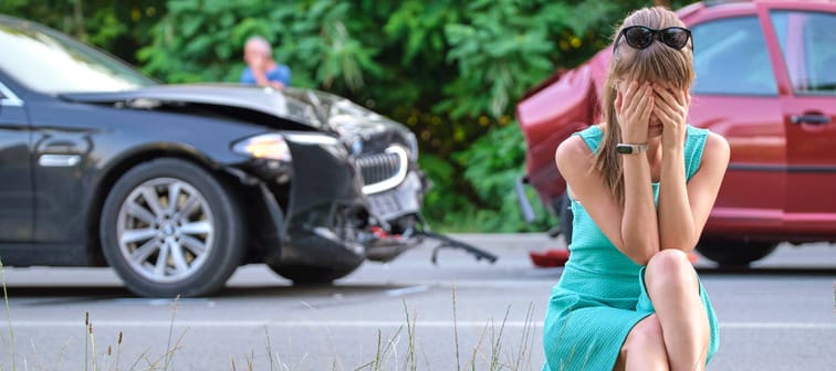 A driver in despair after a car accident.