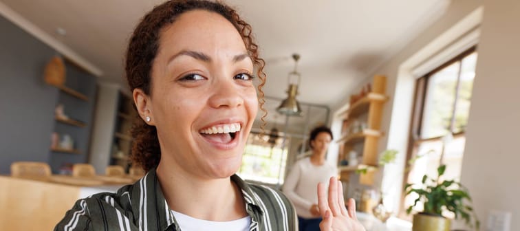 A happy. welcoming homeowner.