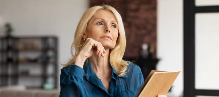 A pensive, mature woman.
