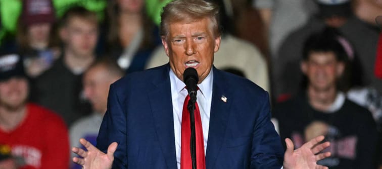 Former US President and Republican presidential candidate Donald Trump speaks during a campaign rally at the Ryder Center for Health and Physical Education at Saginaw Valley State University.