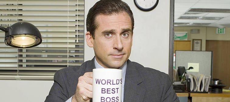 Michael Scott with "World's Best Boss" mug