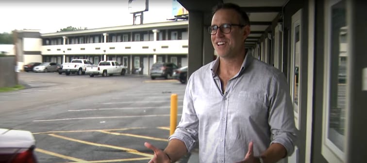 Adam Rosenberg of AGB Real Estate in front of Wallace Studios, a former motel converted into affordable housing.