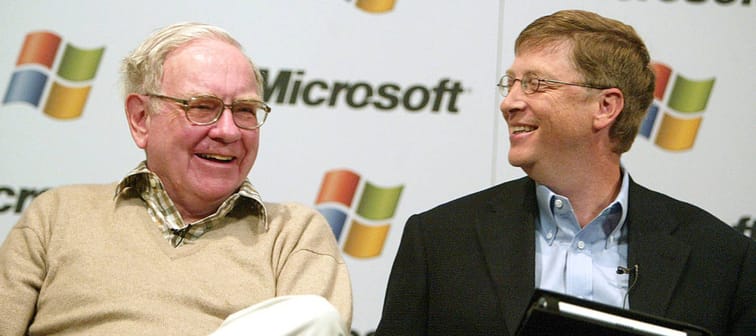 Microsoft Chairman and Chief Software Architect Bill Gates shares a laugh