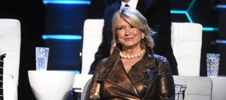 Martha Stewart smiles slyly on stage at the roast of Bruce Willis.