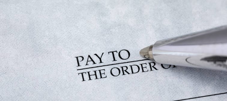 Writing check with pen