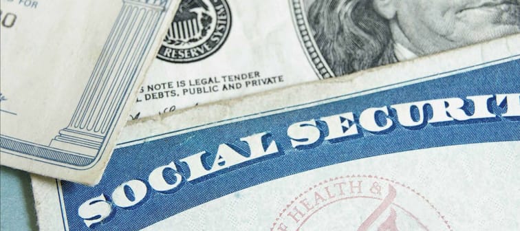 social security cards and US money - retirement concept