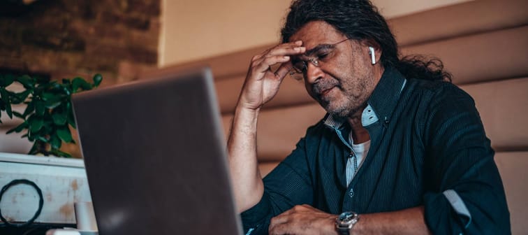Frustrated man at computer