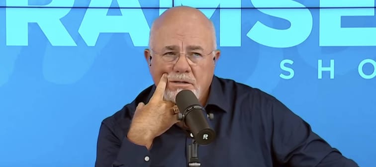 Dave Ramsey seen on set of his radio show, making a concerned face.