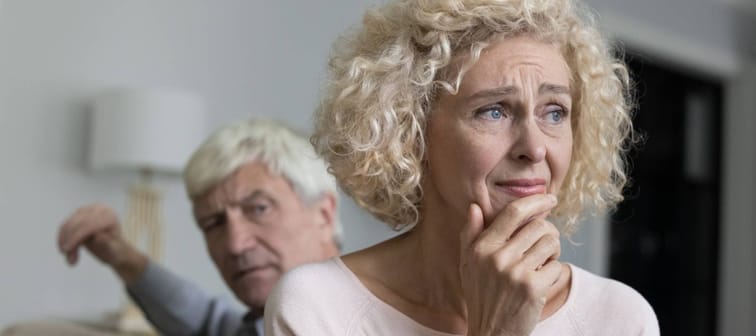 Close up shot of sad disappointed unhappy older woman suffers from misunderstanding