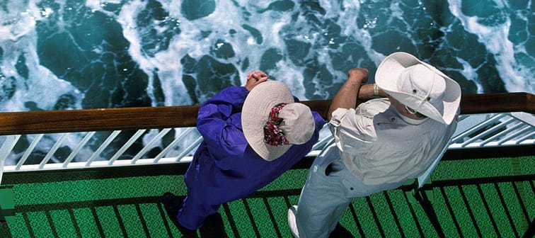 Senior couple on the deck of a cruise ship.