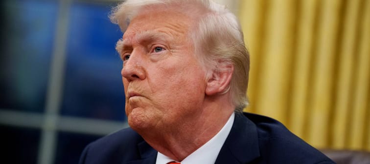 President Donald Trump takes a question from a reporter after signing a series of executive orders in the Oval Office at the White House in Washington, D.C., Feb. 10, 2025.