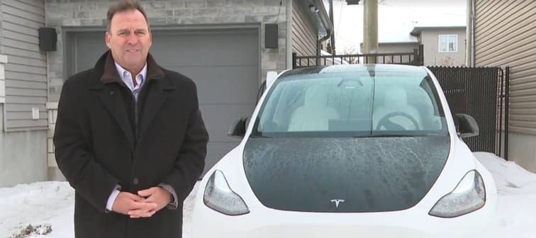 Alain Roy with his Tesla