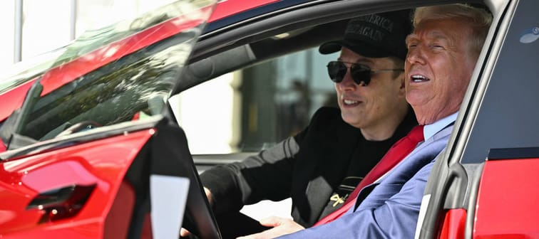 US President Donald Trump and Tesla CEO Elon Musk speak to the press as they sit in a Tesla vehicle on the South Portico of the White House on March 11, 2025 in Washington, DC.
