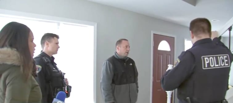 Police entering a home
