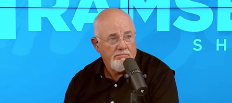Dave Ramsey looks surprised on the set of his radio show.