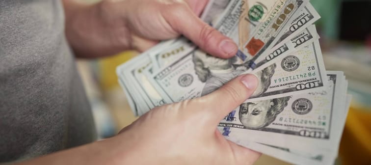 Person holding cash