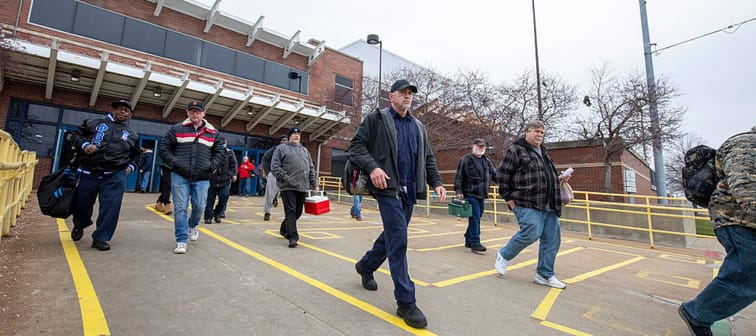 Stellantis workers leave the Warren Stamping Plant at shift change on April 4, 2025 in Warren, Michigan.