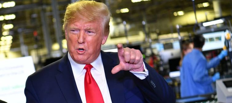 Donald Trump in a factory,.