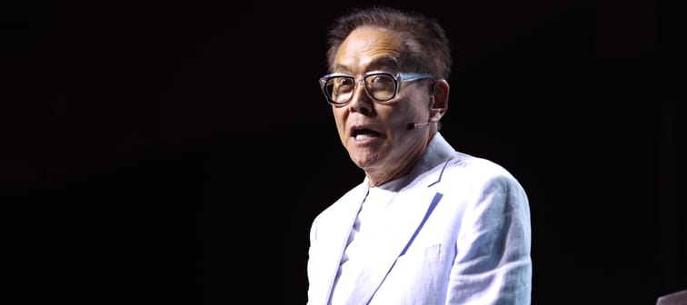 Robert Kiyosaki speaking with attendees at the 2024 FreedomFest at Caesars Forum Conference Center in Las Vegas, Nevada.