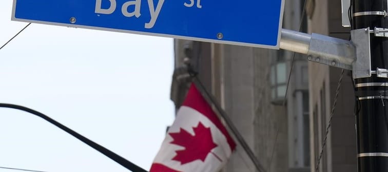 The Bay Street Financial District is shown with the Canadian flag in Toronto on Friday, August 5, 2022. 